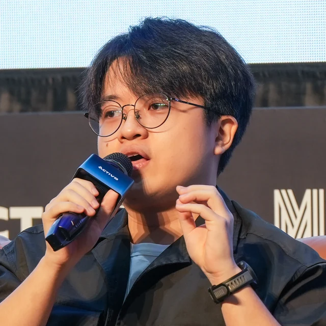 Teh Jun Heng speaking on a panel at MYBW26